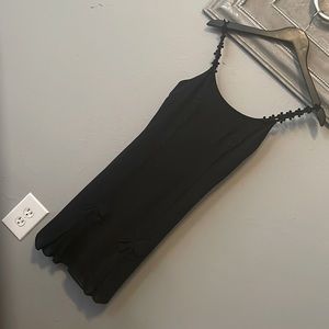 Lindissima spaghetti straps with a flower ribbon accent. Size 4 one time used.